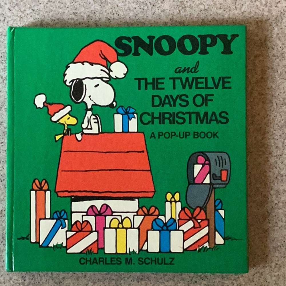 SNOOPY and THE TWELVE DAYS OF CHRISTMAS A POP-UP BOOK BY CHARLES M SCHULZ
